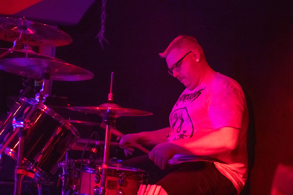a person playing drums