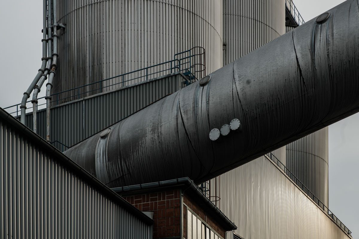 a large metal pipe with a ladder