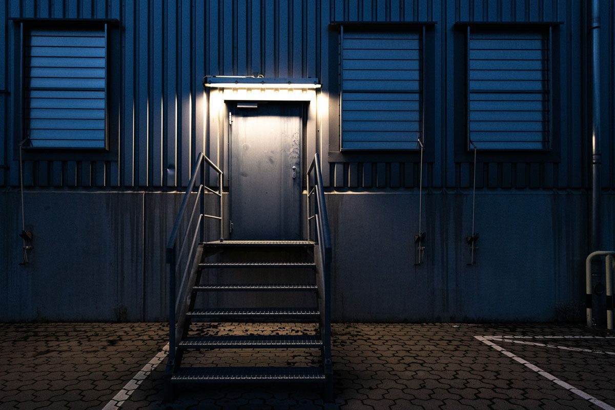 a metal stairs leading to a building